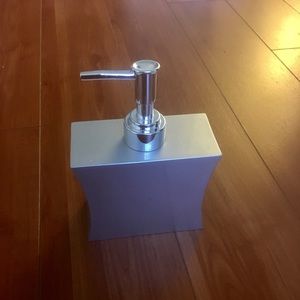 Silver soap dispenser
